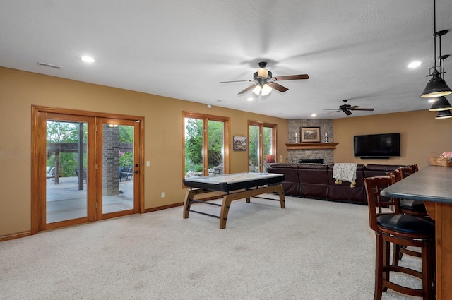 game room with a fireplace, a ceiling fan, light colored carpet, baseboards, and recessed lighting
