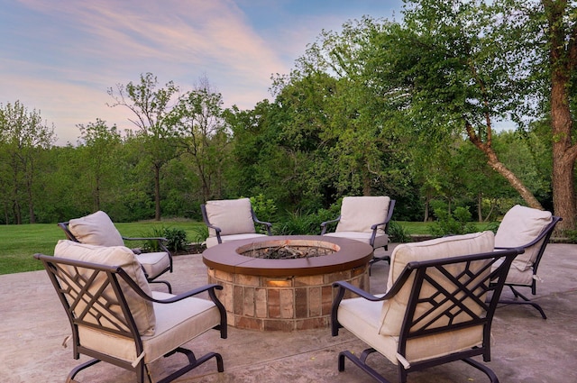 view of patio / terrace featuring a fire pit