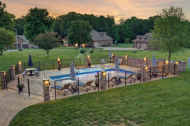 pool at dusk with a patio