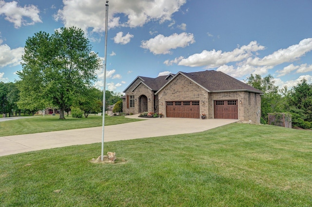 view of front facade featuring a garage, brick siding, concrete driveway, and a front lawn