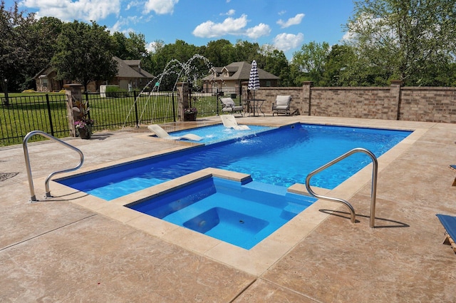 view of pool with an in-ground hot tub and a patio