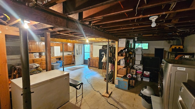 below grade area featuring washer / clothes dryer