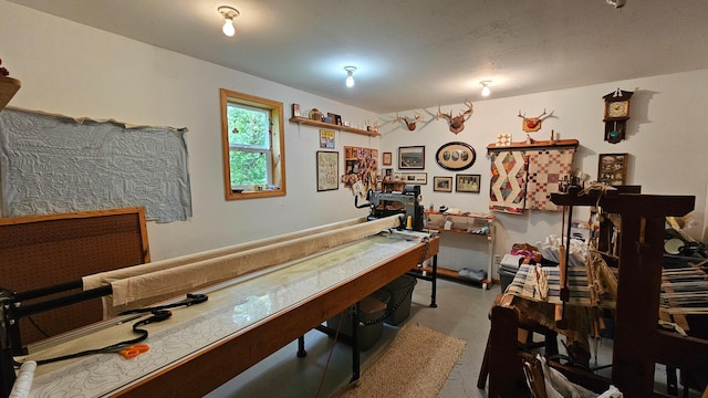 playroom with concrete flooring
