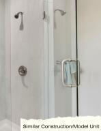 bathroom featuring a stall shower
