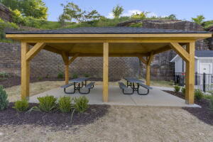 view of community with a gazebo and fence