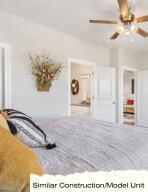 unfurnished bedroom featuring ensuite bath