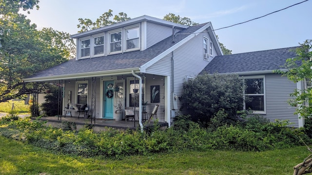 636 W Center St, Rogersville, MO 65742 - view of front of house featuring a shingled roof and covered porch