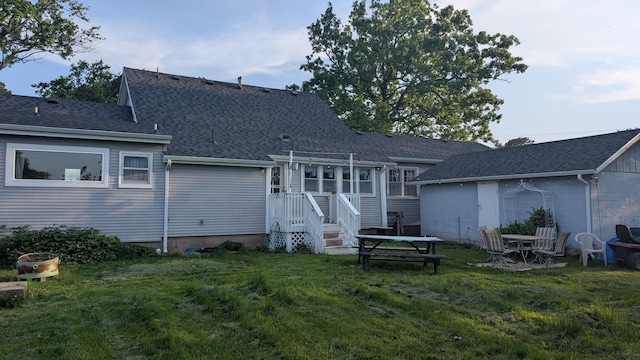 636 W Center St, Rogersville, MO 65742 - back of property featuring a lawn, roof with shingles, and a pergola
