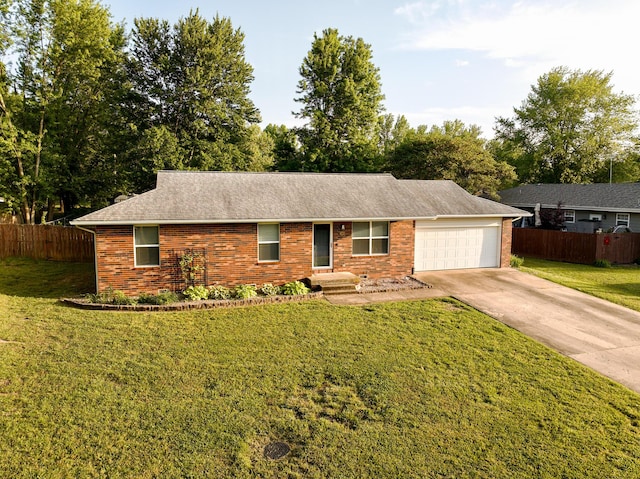 ranch-style house with brick siding, an attached garage, driveway, and a shingled roof