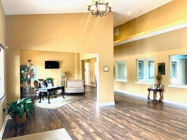 common area with a high ceiling