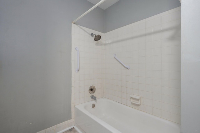 2857 E Linwood St, Springfield, MO 65804 - bathroom featuring bathtub / shower combination and baseboards
