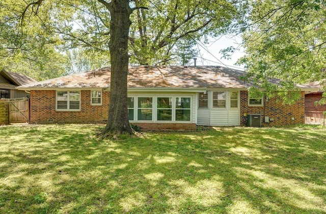 2857 E Linwood St, Springfield, MO 65804 - rear view of property with brick siding and a gate