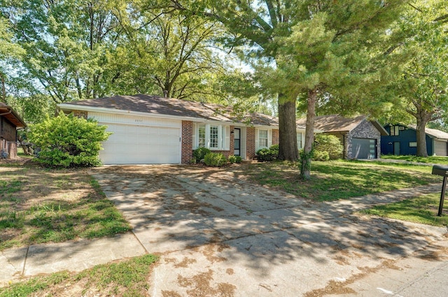 2857 E Linwood St, Springfield, MO 65804 - ranch-style home featuring driveway, a garage, brick siding, and a front lawn