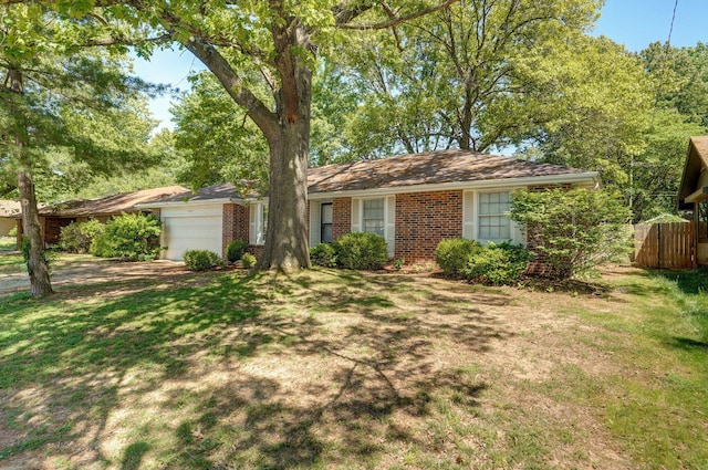 2857 E Linwood St, Springfield, MO 65804 - ranch-style home featuring a garage and brick siding