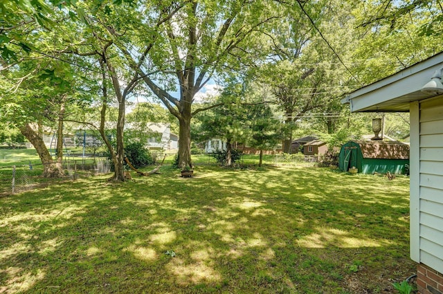 2857 E Linwood St, Springfield, MO 65804 - view of yard featuring a storage shed and an outdoor structure