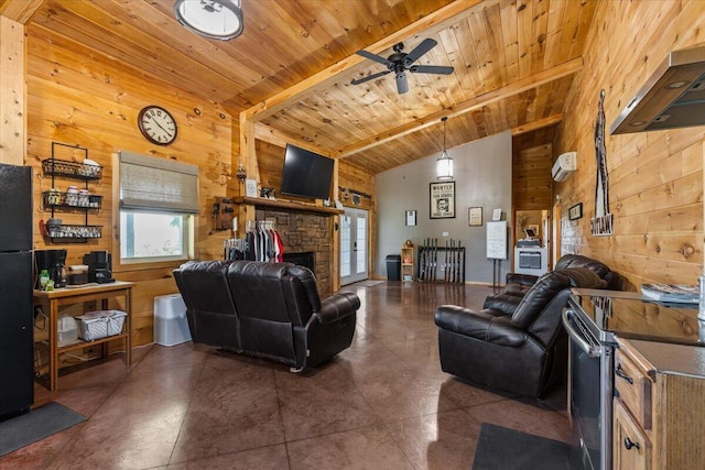 living room featuring wooden walls, wood ceiling, a fireplace, a ceiling fan, and concrete flooring
