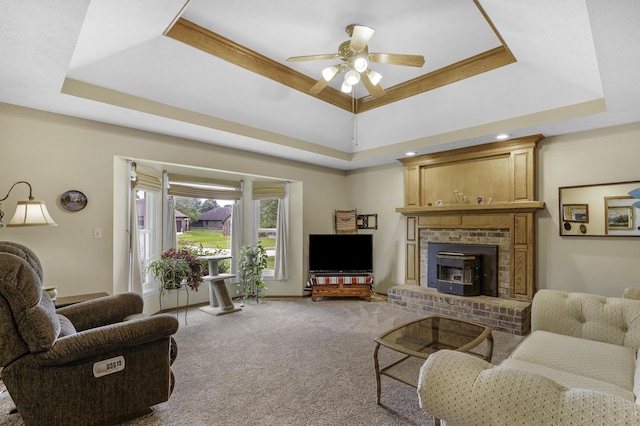 2515 S Laurel Ave, Springfield, MO 65807 - living area featuring a raised ceiling, light colored carpet, and ceiling fan