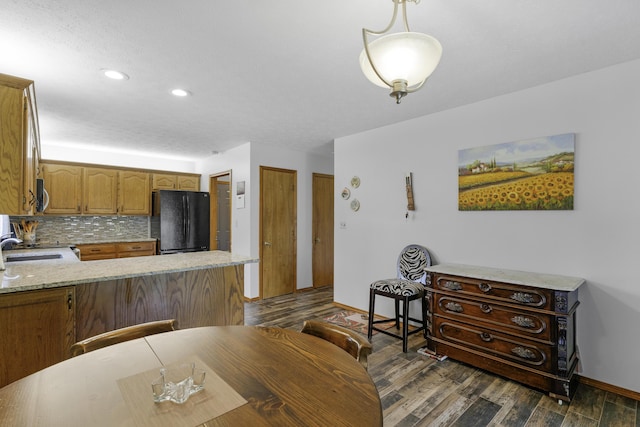 2515 S Laurel Ave, Springfield, MO 65807 - dining room with baseboards, dark wood-style flooring, and recessed lighting