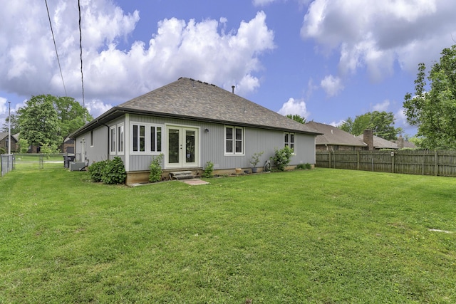 2515 S Laurel Ave, Springfield, MO 65807 - rear view of house featuring french doors and roof with shingles
