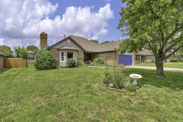 2515 S Laurel Ave, Springfield, MO 65807 - ranch-style house with a garage, driveway, a chimney, brick siding, and roof with shingles