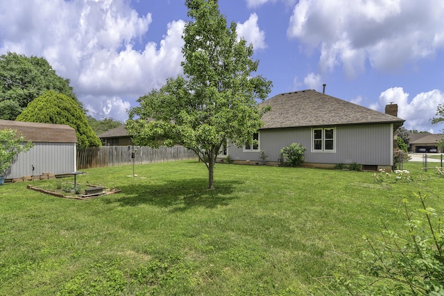 2515 S Laurel Ave, Springfield, MO 65807 - view of yard with an outdoor structure and a storage shed