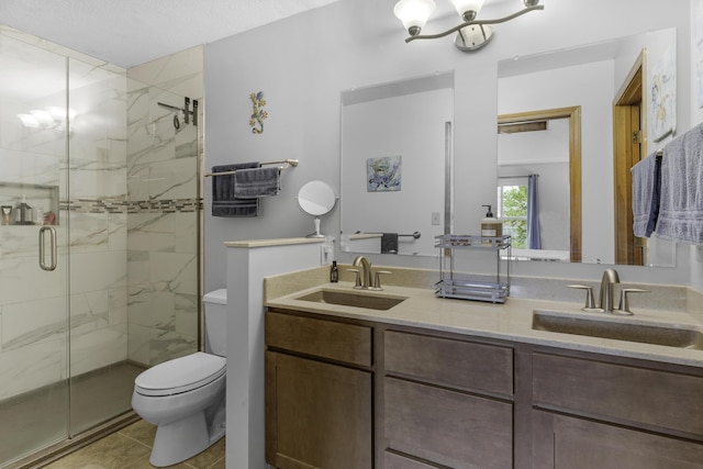 2515 S Laurel Ave, Springfield, MO 65807 - full bathroom featuring toilet, a marble finish shower, double vanity, tile patterned floors, and a chandelier