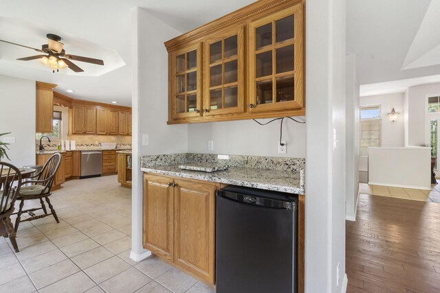 40 Overton Ct, Kimberling City, MO 65686 - kitchen featuring stainless steel dishwasher, a sink, a ceiling fan, plenty of natural light, and recessed lighting