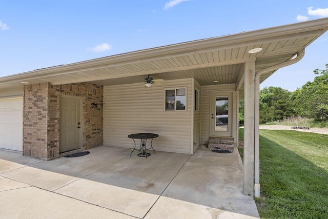 40 Overton Ct, Kimberling City, MO 65686 - view of patio featuring ceiling fan and a garage