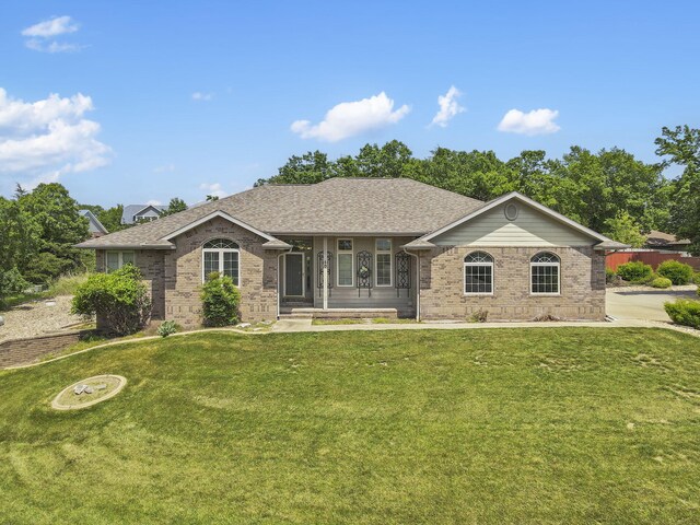 40 Overton Ct, Kimberling City, MO 65686 - single story home with a front lawn, brick siding, and a shingled roof