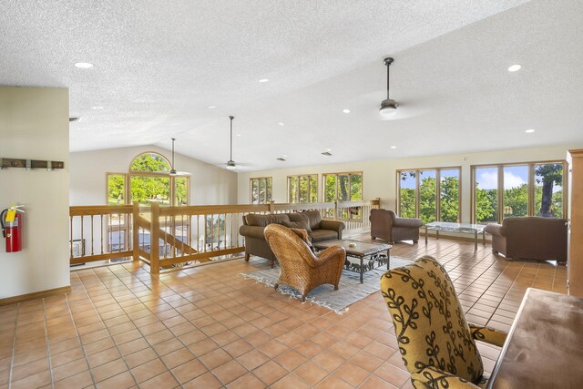 40 Overton Ct, Kimberling City, MO 65686 - living room featuring ceiling fan, lofted ceiling, light tile patterned floors, a textured ceiling, and recessed lighting