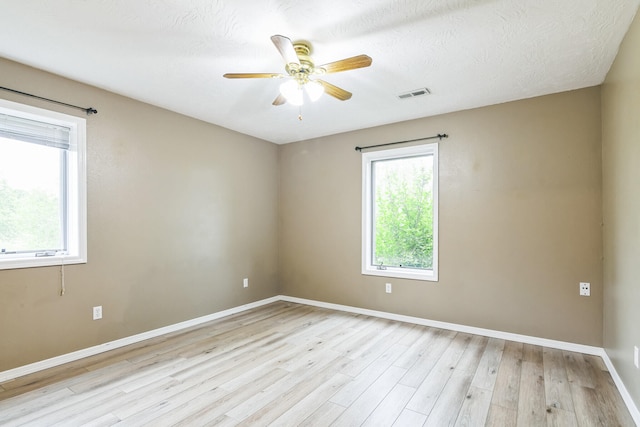 1888 S High Rdg, Nixa, MO 65714 - spare room featuring light wood-style flooring, baseboards, and a ceiling fan