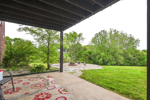 1888 S High Rdg, Nixa, MO 65714 - view of patio featuring an outdoor fire pit