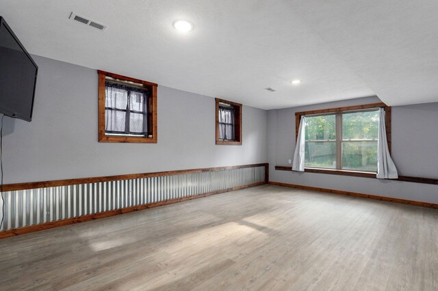 2121 E 505th Rd, Halfway, MO 65663 - unfurnished room with wood finished floors, baseboards, and recessed lighting