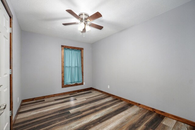2121 E 505th Rd, Halfway, MO 65663 - spare room with wood finished floors, ceiling fan, and baseboards