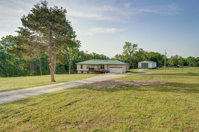 2121 E 505th Rd, Halfway, MO 65663 - view of front facade with driveway and an attached garage