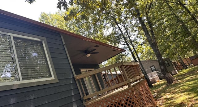 64 Deer Park Cir, Kimberling City, MO 65686 - view of home's exterior featuring a ceiling fan and a wooden deck