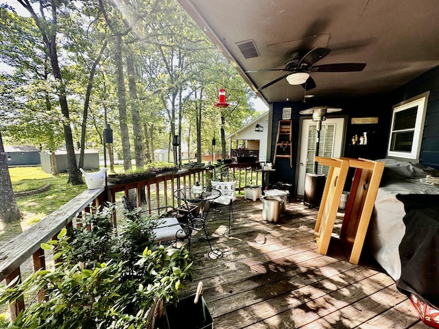 64 Deer Park Cir, Kimberling City, MO 65686 - deck featuring ceiling fan, a shed, and an outdoor structure