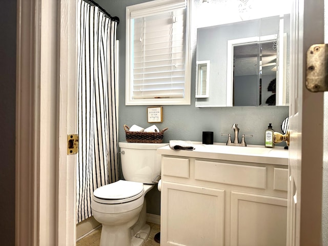 64 Deer Park Cir, Kimberling City, MO 65686 - bathroom with toilet, vanity, tile patterned flooring, and curtained shower
