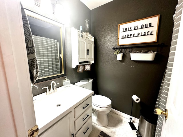 64 Deer Park Cir, Kimberling City, MO 65686 - bathroom featuring marble finish floors, toilet, a textured wall, vanity, and baseboards