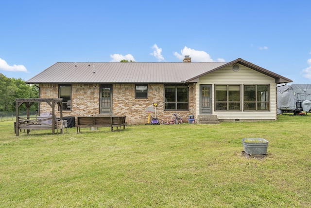 1065 Nicks Rd, Bradleyville, MO 65614 - back of property featuring a yard, brick siding, entry steps, metal roof, and a chimney