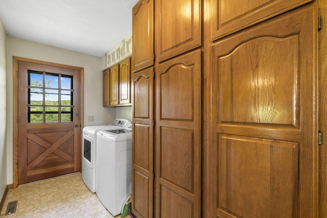 1065 Nicks Rd, Bradleyville, MO 65614 - laundry room with washer and dryer, cabinet space, and light floors