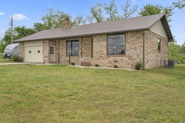 1065 Nicks Rd, Bradleyville, MO 65614 - view of front of house featuring an attached garage, cooling unit, brick siding, concrete driveway, and a front lawn