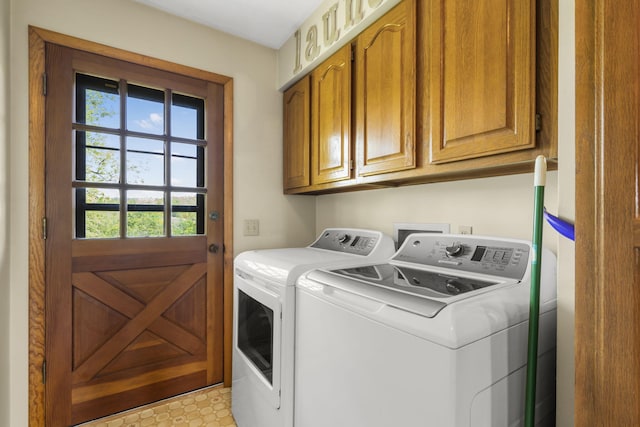 1065 Nicks Rd, Bradleyville, MO 65614 - washroom with washer and clothes dryer and cabinet space