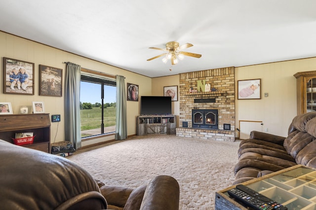1065 Nicks Rd, Bradleyville, MO 65614 - carpeted living area with a ceiling fan and a brick fireplace