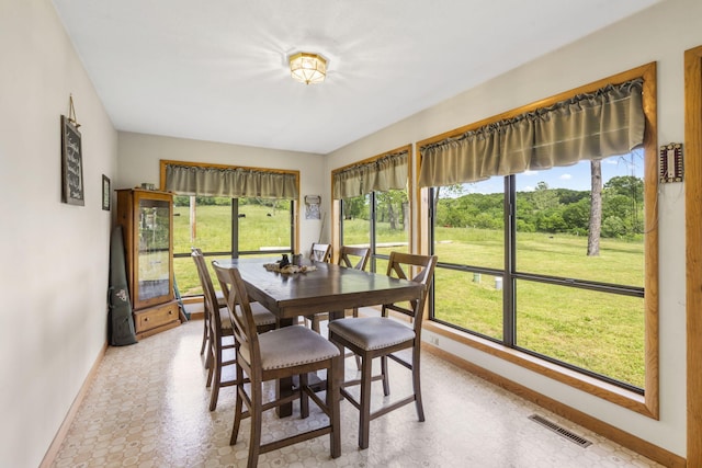 1065 Nicks Rd, Bradleyville, MO 65614 - dining room featuring baseboards