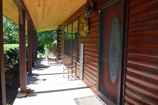 643 County Road 3450, Mountain View, MO 65548 - entrance to property with covered porch and log veneer siding