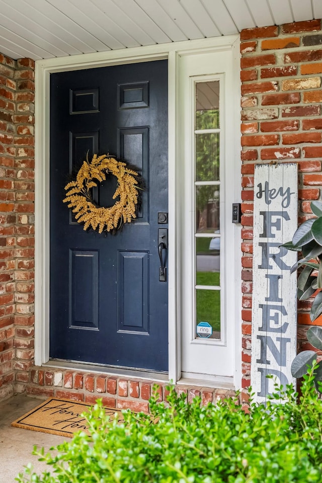 178 S Peach Tree Ln, Republic, MO 65738 - property entrance featuring brick siding