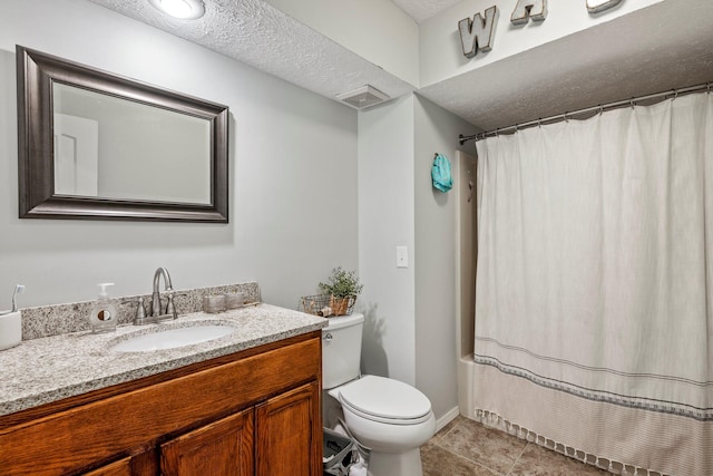 178 S Peach Tree Ln, Republic, MO 65738 - bathroom featuring vanity, toilet, tile patterned floors, a textured ceiling, and baseboards