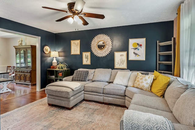 178 S Peach Tree Ln, Republic, MO 65738 - living room with a ceiling fan, wood finished floors, and baseboards