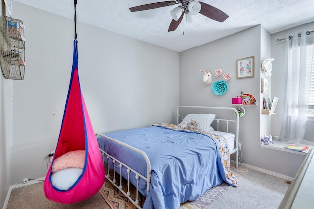 178 S Peach Tree Ln, Republic, MO 65738 - carpeted bedroom featuring a textured ceiling, baseboards, and ceiling fan